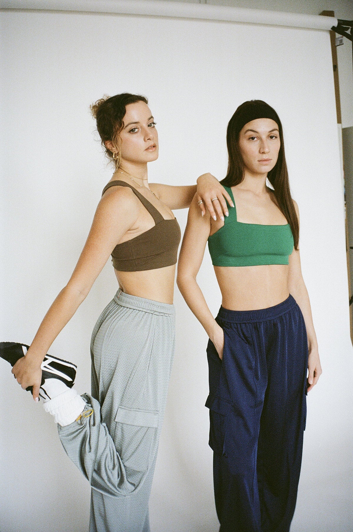 Image of WOA Models Wearing the Arena Pant in Mineral Grey and Classic Navy