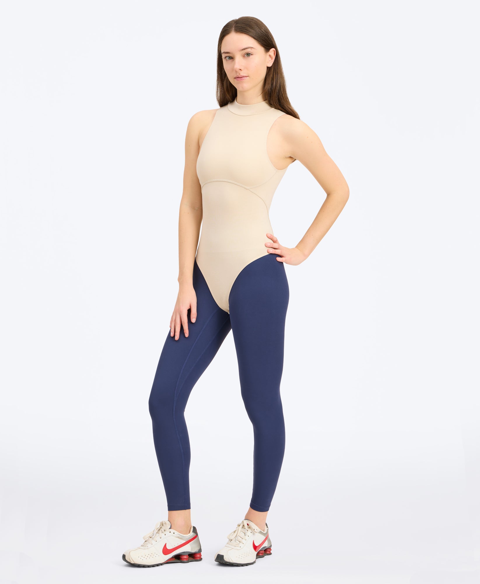 Wear One's At Aerobic Rib Bodysuit in oatmeal on studio model front styled view