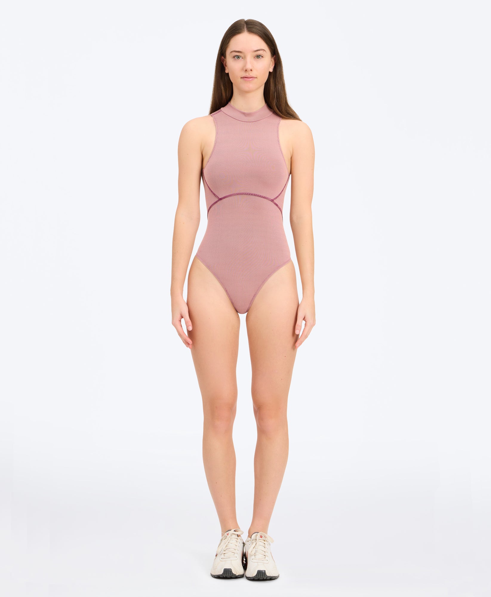 Wear One's At Aerobic Rib Bodysuit in Rose Cloud on studio model front view