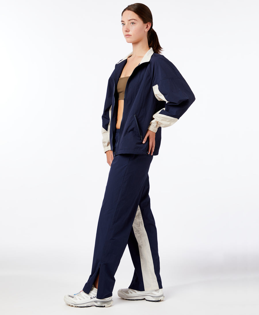 Wear One's At Alpine Pant in Navy Dune on model side view