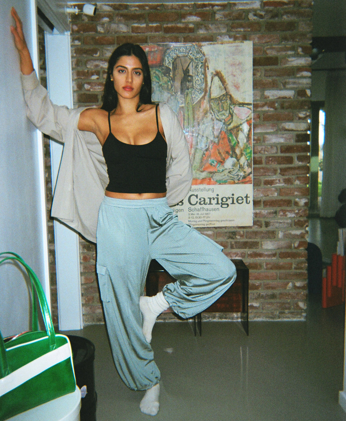 Wear One's At Arena Pant in mineral on model balancing on right leg front view