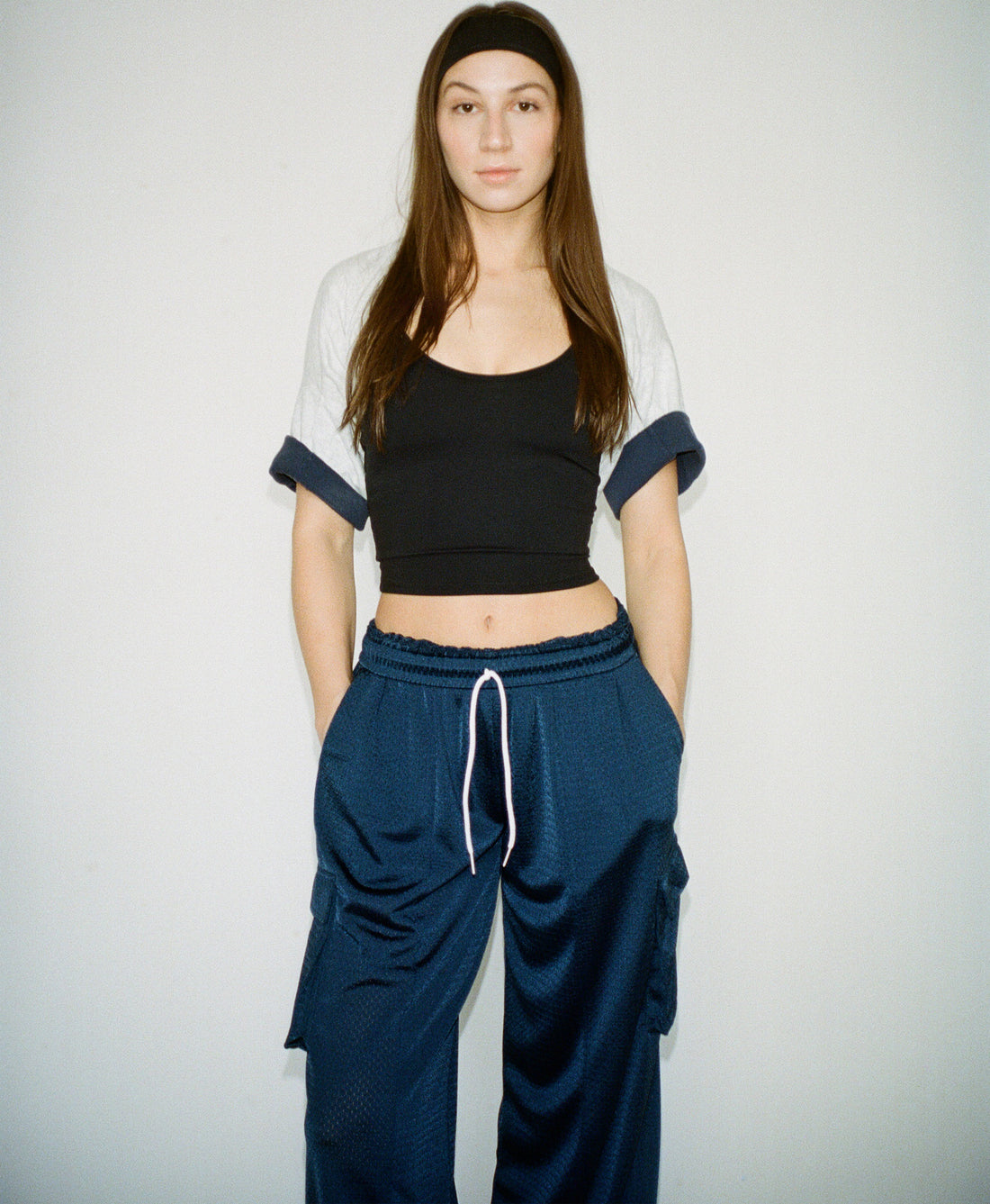 Wear One's At Arena Pant in navy on model with hands in pockets front view