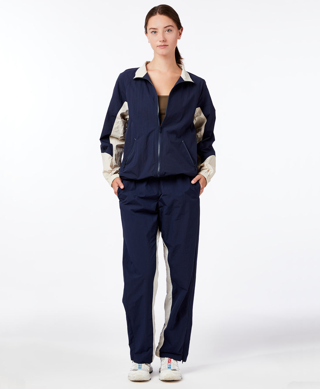 Wear One's At Colorblock Windbreaker in Navy Dune on model with hands in pockets front view