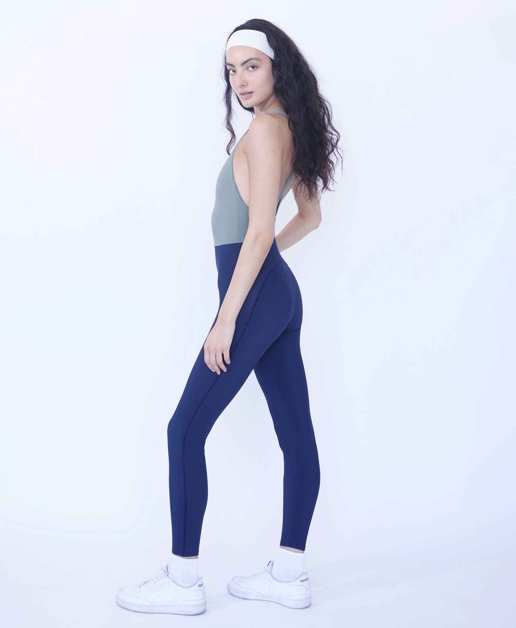 Wear One's At Liberty Unitard in Sage and Navy on Model Full Side View