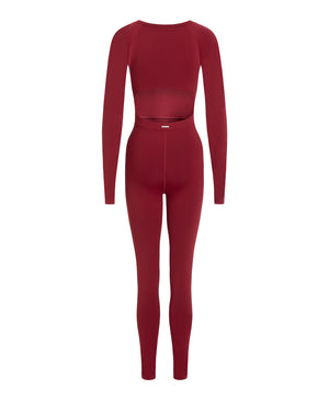 Wear One's At Long Sleeve Varsity Unitard in pomegranate back ghost mannequin image