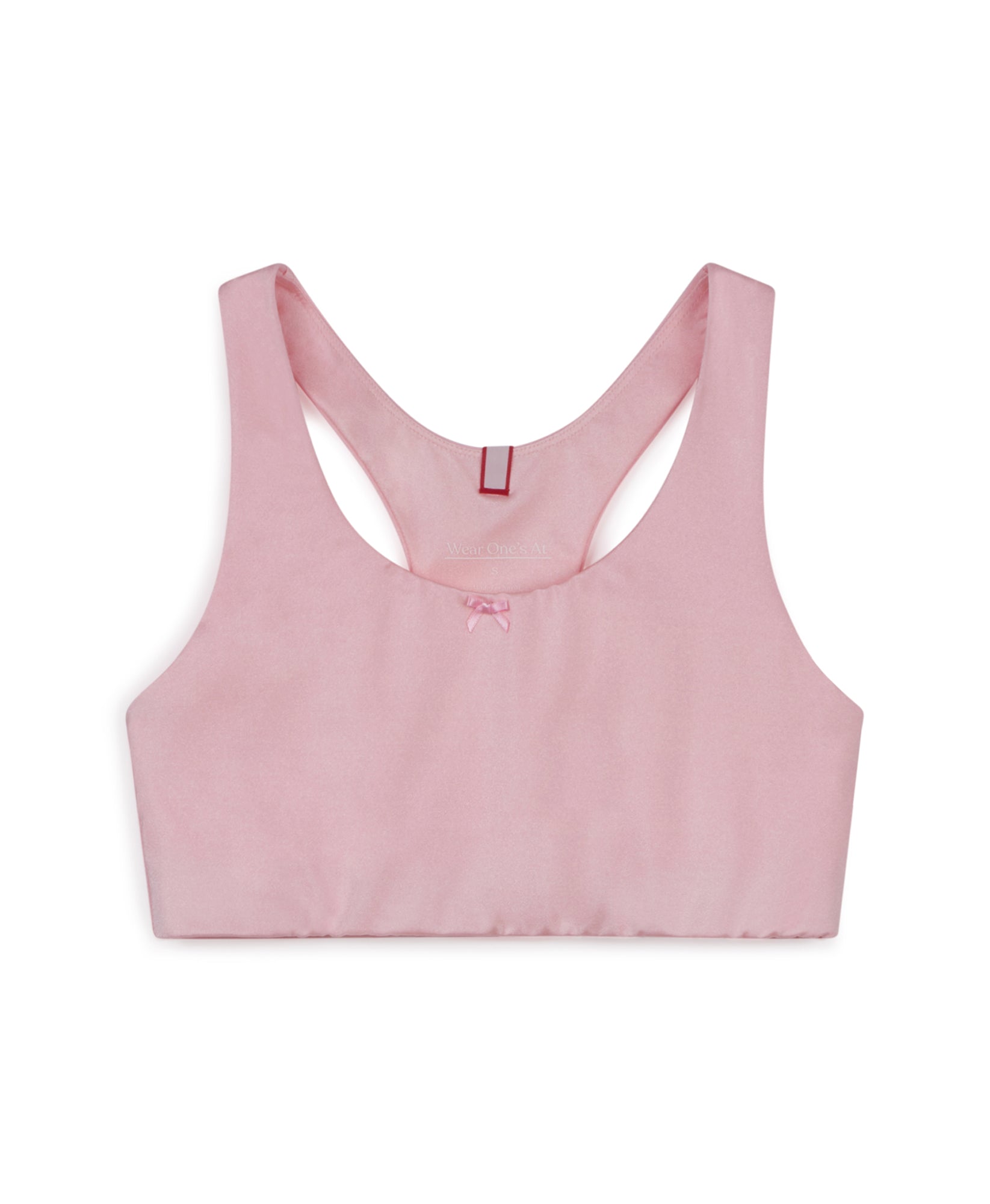 Wear One's At Race You Back Bra in ballet on model standing in doorway