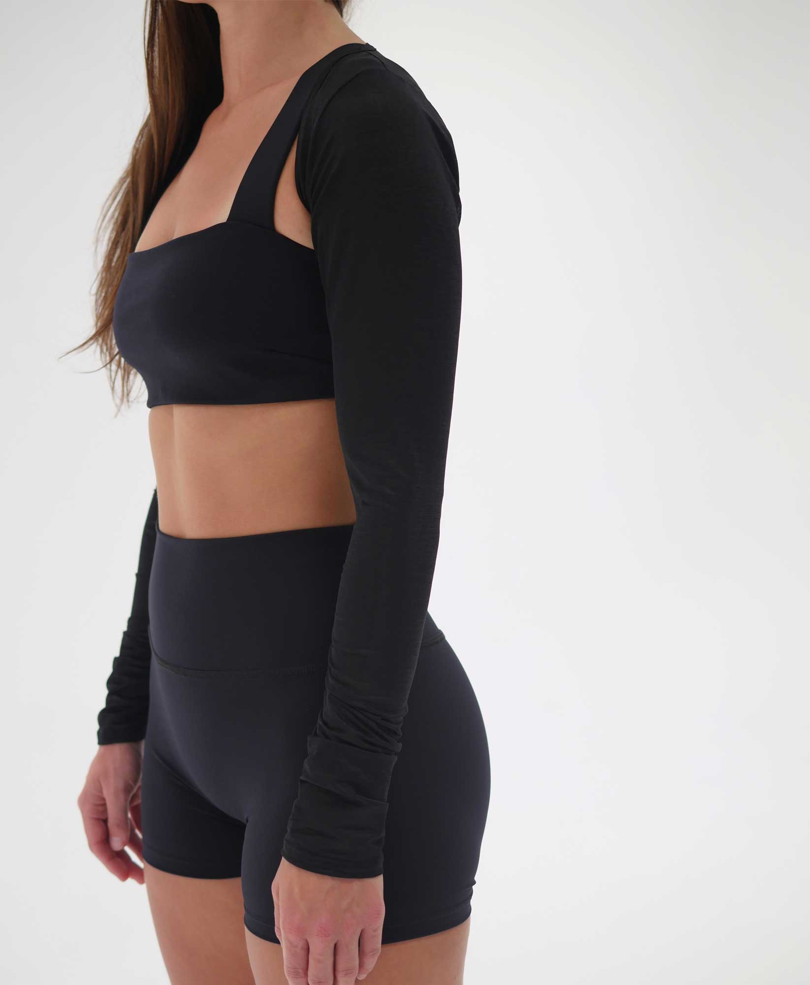 Wear One's At The Scrunch Shrug in Goji Black on model cropped side view