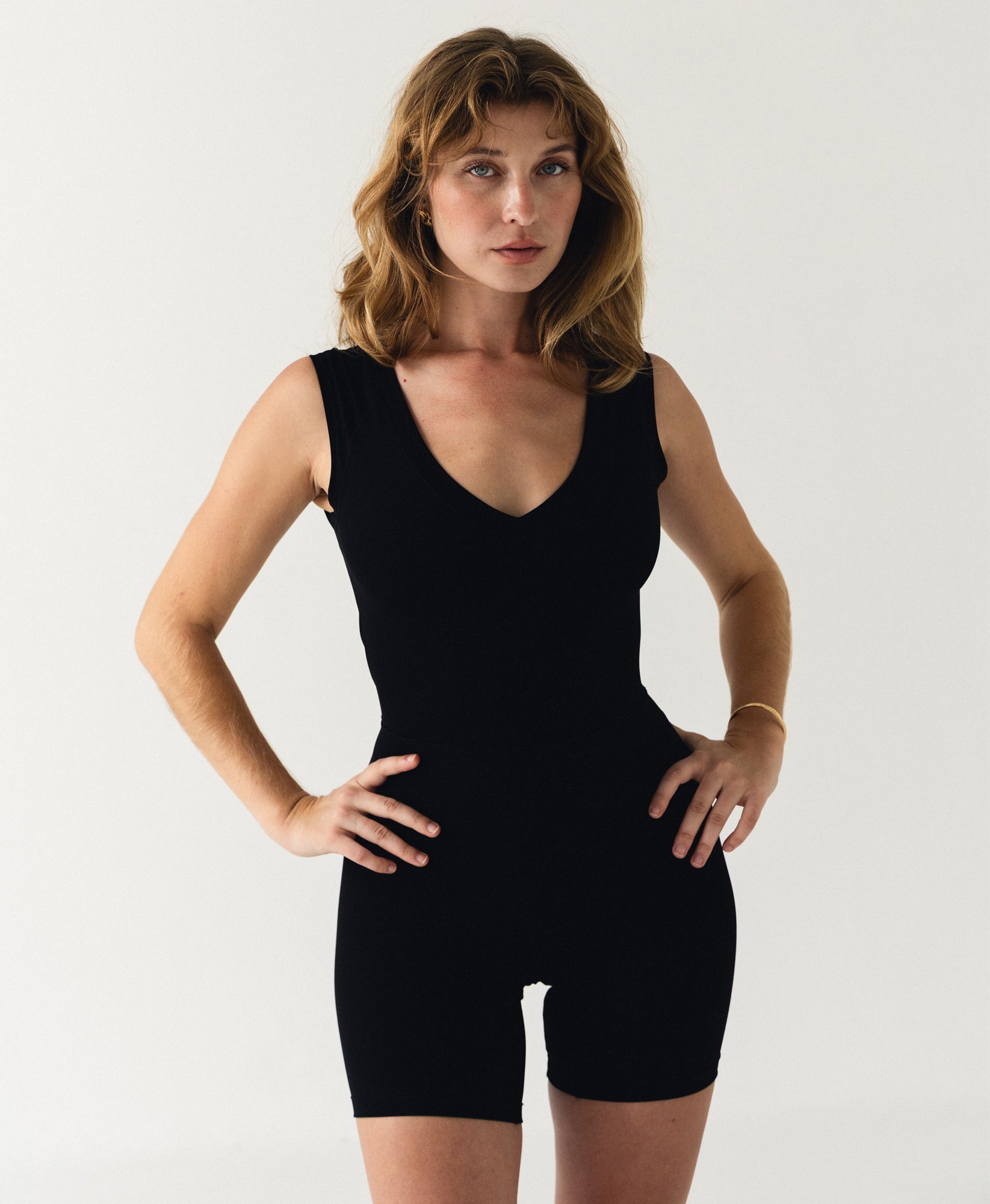 Wear One's At Varsity Bike Short Unitard in bolt on model with hands on hips front view