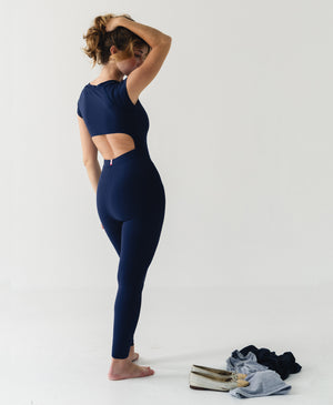 Wear One's At Varsity Unitard in navy on model looking down full back view