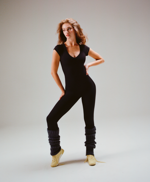 Wear One's At Varsity Unitard in Shadow on model with hand on hip