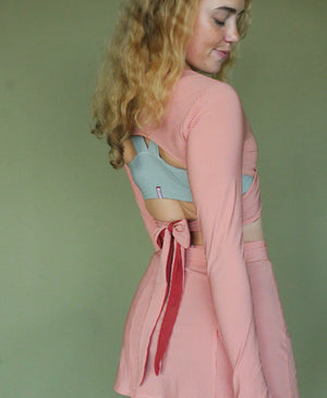 Wear One's At All Wrapped Up Top in Clay Orange on Model Back Side View