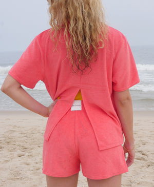 Wear One's At Aqualina Terry Cloth Shorts in Aperol Pink on Model Back Detail View