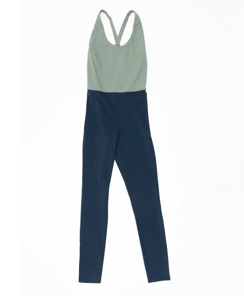 Wear One's At Liberty Unitard in Sage and Navy on Model with Arms Up Front View