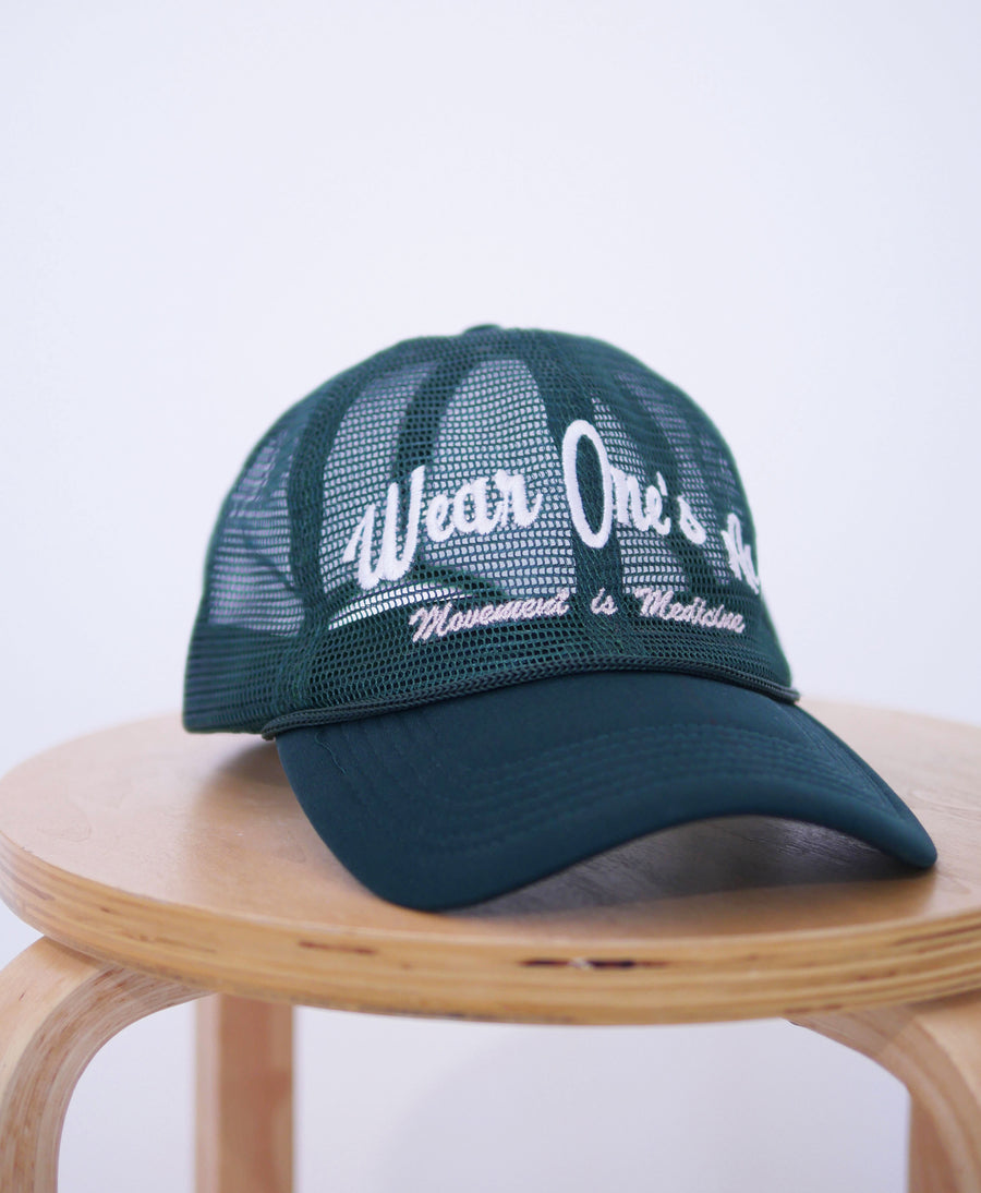 Wear One's At Logo Trucker Hat in Pine Front Closeup View